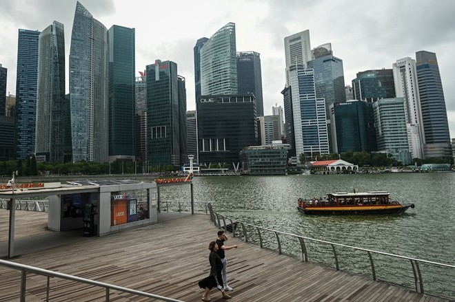 Bộ Thương mại và Công nghiệp Singapore đã hạ dự báo tăng trưởng GDP năm 2025 của nước này xuống còn 0 - 2%. Ảnh: AFP