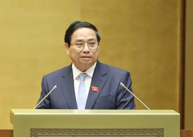 Thủ tướng Phạm Minh Chính trình bày báo cáo - Ảnh: Duy Linh