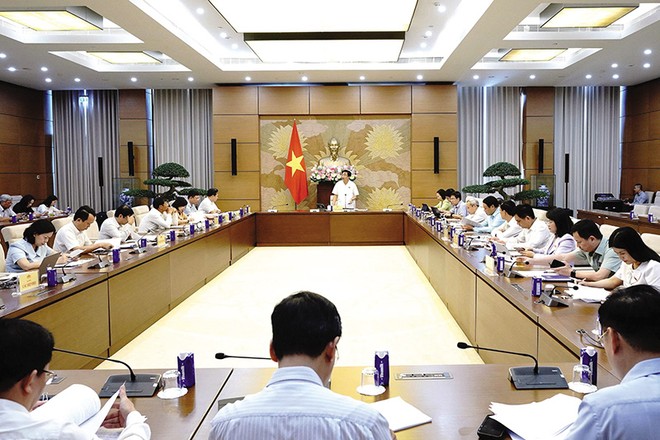 Toàn cảnh phiên thẩm tra sơ bộ Dự án Luật Phá sản (sửa đổi) của Thường trực Ủy ban Kinh tế và Tài chính của Quốc hội. Ảnh: Cao Hoàng