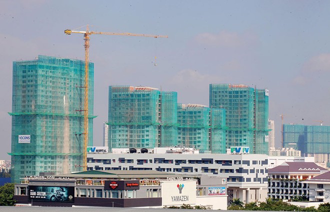 Nếu theo đúng quy định hiện hành, đa phần ngân hàng không thể đủ tiềm lực bảo lãnh nhiều dự án bất động sản.
ảnh: Lê Toàn