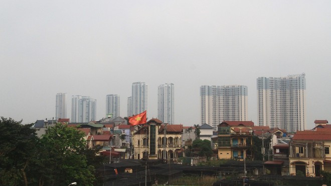 Các dự án nhà ở đang lan ra vùng ngoại vi theo vệt loang đô thị. Ảnh: Bình Minh.