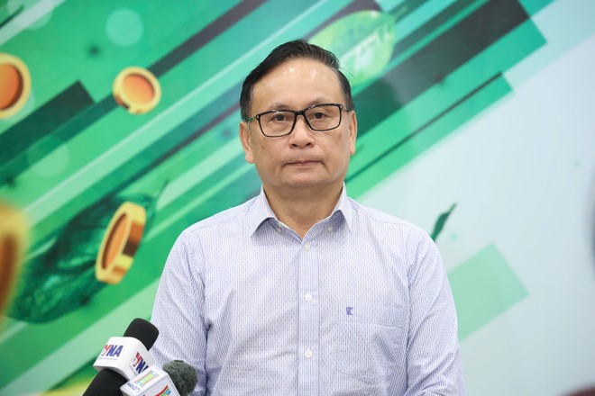 Ông Nguyễn Sơn, Chủ tịch HĐQT Tổng Công ty Lưu ký và Bù trừ Chứng khoán (VSD) trao đổi với báo chí bên lề tọa đàm "Lực đẩy dòng vốn mới" do Báo Tài chính- Đầu tư tổ chức ngày 23/7. Ảnh Dũng Minh