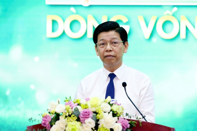 Ông Phạm Văn Hoành, Tổng Biên tập Báo Tài chính - Đầu tư phát biểu khai mạc Tọa đàm "Lực đẩy dòng vốn mới" sáng 23/7 (Ảnh: Dũng Minh)