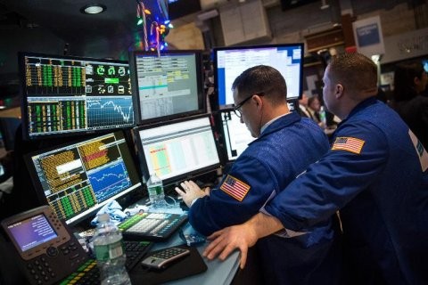Phố Wall đảo chiều tăng trở lại trong phiên cuối tuần (Ảnh minh họa: AFP)