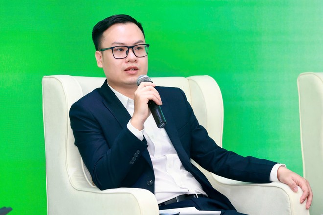Ông Đỗ Thanh Lâm, Chuyên viên Vụ Pháp chế, Bộ Tài chính phát biểu tại Hội thảo sáng 14/10 - Ảnh: Chí Cường