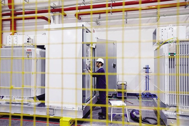 Doanh nghiệp mong mỏi được gỡ bỏ những rào cản trong kinh doanh liên quan đến điều kiện kinh doanh, thủ tục hành chính... Ảnh: Đức Thanh