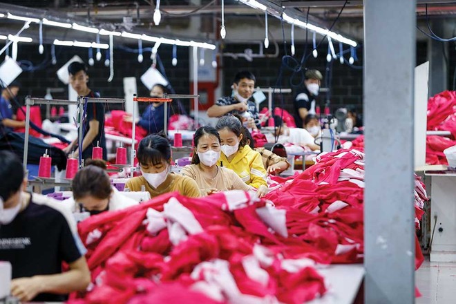 Nhiều doanh nghiệp, trong đó có dệt may, đã tận dụng tốt ưu đãi từ các FTA để gia tăng xuất khẩu. Ảnh: Đức Thanh 