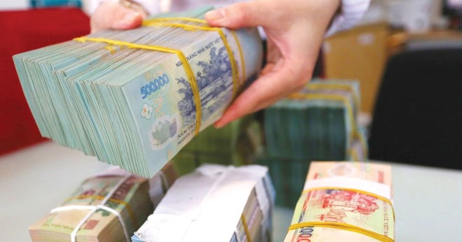 Dự thảo Luật Ngân sách nhà nước (sửa đổi) nâng mức trần nợ vay cho các địa phương lên 80 - 120% số dự toán thu ngân sách địa phương được hưởng theo phân cấp. Ảnh: Minh Dũng