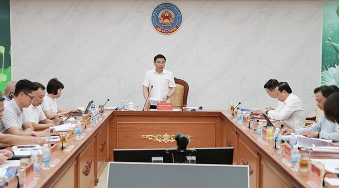 Bí thư Đảng ủy, Bộ trưởng Bộ Tài chính Nguyễn Văn Thắng phát biểu tại hội nghị. Ảnh: Mạnh Tuấn.