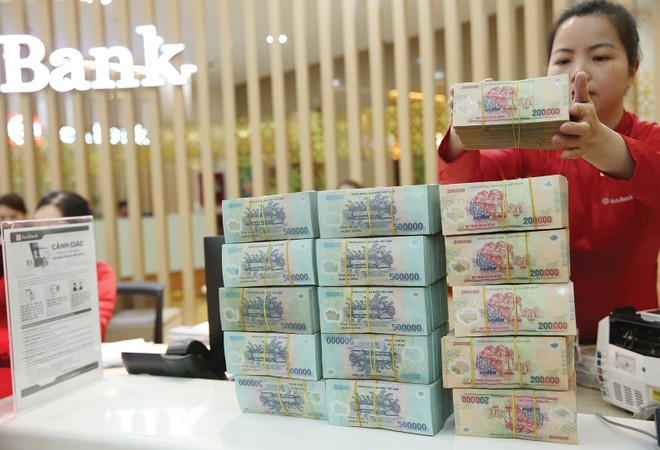 Đẩy mạnh xử lý nợ xấu sẽ khơi thông nguồn vốn, từ đó tạo cơ hội cho ngân hàng giảm lãi suất