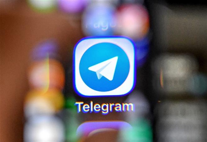 Biểu tượng ứng dụng Telegram trên màn hình điện thoại. Ảnh: AFP/TTXVN