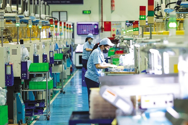 Việt Nam sở hữu những lợi thế rõ ràng về sản xuất và thu hút dòng vốn FDI so với các quốc gia trong khu vực. Ảnh: Đức Thanh 