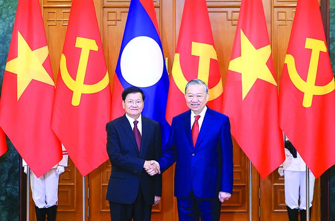 Tổng Bí thư Tô Lâm và Tổng Bí thư, Chủ tịch nước Lào Thongloun Sisoulith chụp ảnh chung trước khi tiến hành hội đàm nhân chuyến thăm cấp Nhà nước của Tổng Bí thư, Chủ tịch nước Lào tới Việt Nam vào tháng 1/2026. Ảnh: Đức Thanh 