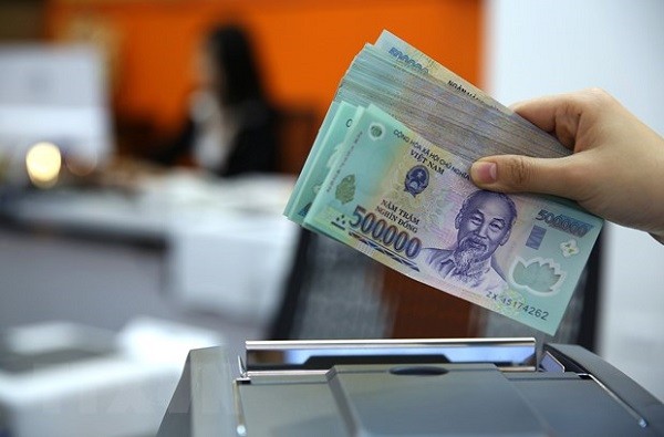 Hơn 2 triệu tỷ tiền gửi tổ chức kinh tế chảy ra khỏi hệ thống ngân hàng, tổng tiền gửi vẫn tăng nhẹ 