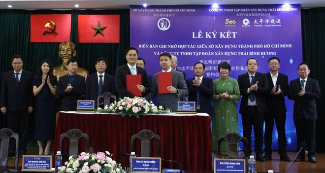 Quang cảnh lễ ký kết biên bản hợp tác ghi nhớ giữa Tập đoàn xây dựng Thái Bình Dương và Sở Xây dựng TP.HCM. Ảnh: T.K