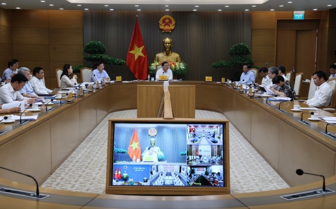 Phó Thủ tướng Thường trực Phạm Gia Túc làm việc về tình hình triển khai dự án đường sắt Lào Cai - Hà Nội - Hải Phòng - Ảnh: VGP