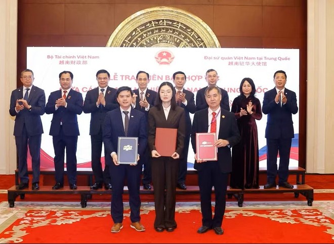 Lễ trao biên bản hợp tác giữa các doanh nghiệp Việt Nam-Trung Quốc ngày 14/4/2026. (Ảnh: Thống Nhất/TTXVN)