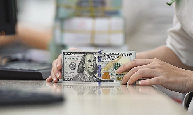 Nhu cầu ngoại tệ dự báo tiếp tục tăng trong những tháng cuối năm, gây áp lực lên tỷ giá 