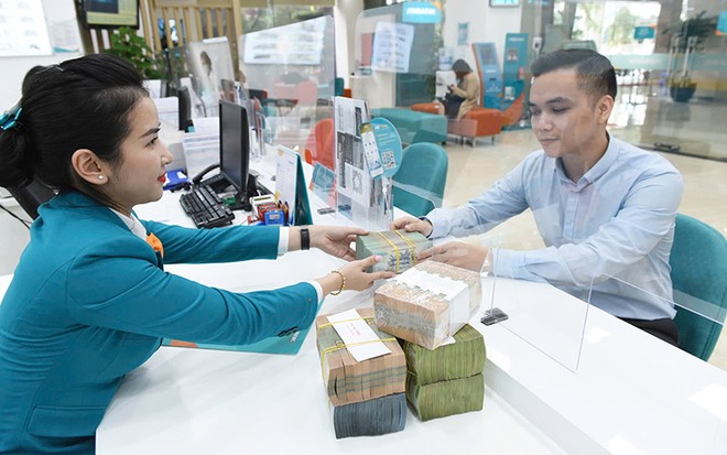 Hiện tiền gửi tại các ngân hàng chủ yếu là ngắn hạn, gây áp lực rất lớn khi ngân hàng cho vay những đại dự án hạ tầng có thời gian thu hồi vốn dài. Ảnh: Dũng Minh 
