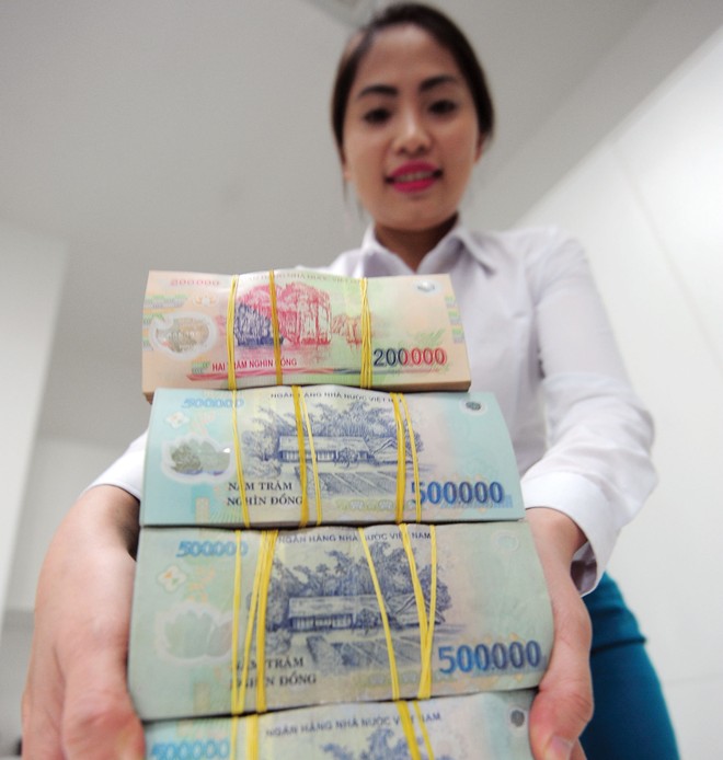 Chênh lệch giữa tăng trưởng tín dụng và huy động vốn vẫn đặt ra yêu cầu cân đối thanh khoản và cơ cấu nguồn vốn với ngành ngân hàng