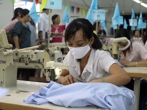 Sản xuất hàng dệt may xuất khẩu. Ảnh minh họa. (Nguồn: Thanh Vũ/TTXVN)