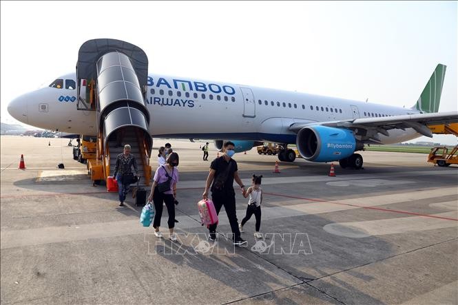 Hành khách đi trên chuyến bay của Bamboo Airways. Ảnh minh họa: Huy Hùng/TTXVN