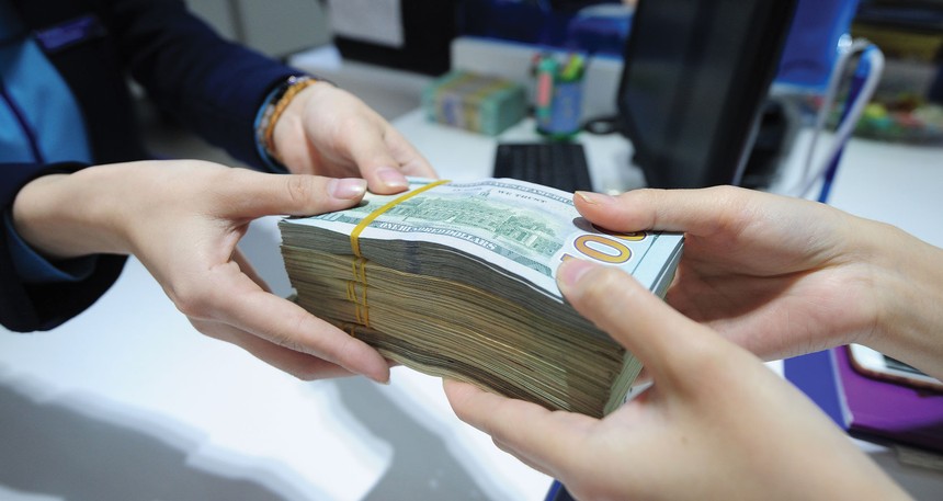 Dù Fed tăng lãi suất USD và cầu thanh toán ngoại tệ gia tăng, song tỷ giá tiền đồng cuối năm vẫn ít chịu ảnh hưởng