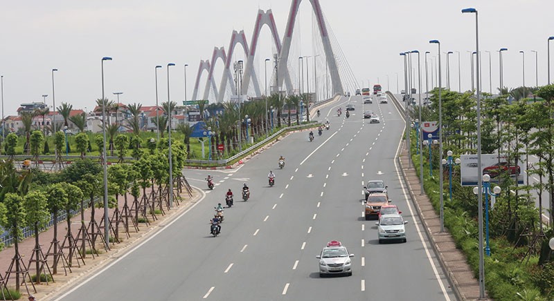 Hạ tầng giao thông phát triển khiến nhiều người có xu hướng chọn mua nhà ở ngoại ô để sinh sống. Ảnh: Dũng Minh