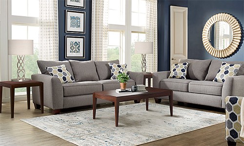 Bàn trà, bàn để cạnh sofa hay thảm là những thứ chưa phải mua ngay lập tức khi có nhà mới. Ảnh minh họa: Roomtogo. 