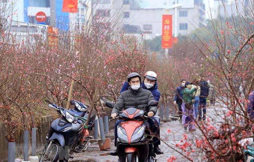 Bộ Lao động-Thương binh và Xã hội đưa ra 2 phương án nghỉ Tết Nguyên đán năm 2023 với số ngày nghỉ có thể kéo dài 7 ngày hoặc 9 ngày. (Ảnh minh hoạ: Tuấn Anh/TTXVN)