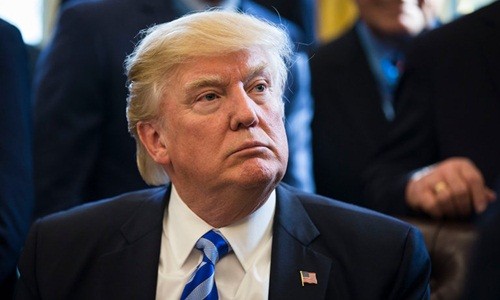 Tổng thống Mỹ Donald Trump tại cuộc họp báo ở Phòng Bầu dục, Nhà Trắng, hôm 24/3. Ảnh:New York Times