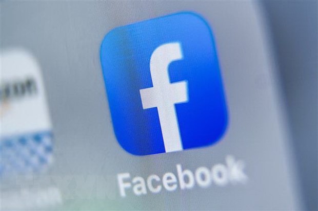 Biểu tượng của Facebook trên màn hình máy tính bảng. (Ảnh: AFP/TTXVN).