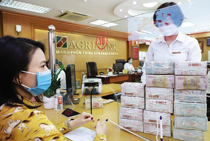 Agribank vẫn là quán quân về tổng thu nhập hoạt động trong 6 tháng đầu năm, đứng trên BIDV, Vietcombank và VietinBank. Ảnh: Đức Thanh 