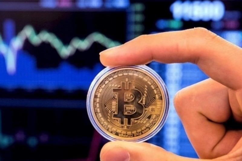 Giá Bitcoin đã giảm gần 9% trong một tháng qua và hiện ở mức 88.000 USD vào lúc 9:30 sáng ngày 7/3. Ảnh: AFP 