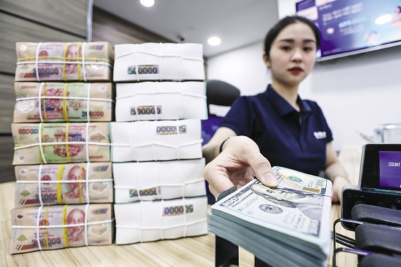 Tính đến hết tháng 3/2025, dư nợ tín dụng kinh doanh bất động sản đạt hơn 1,56 triệu tỷ đồng. Ảnh: Lê Toàn