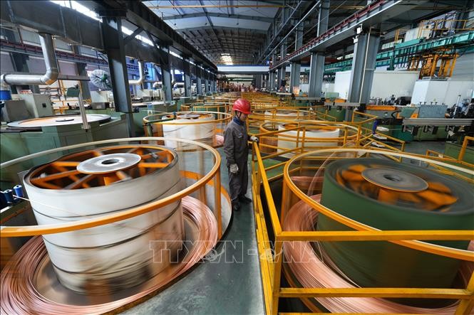 Đồng được sản xuất tại nhà máy ở tỉnh Chiết Giang, Trung Quốc. Ảnh minh họa: THX/TTXVN