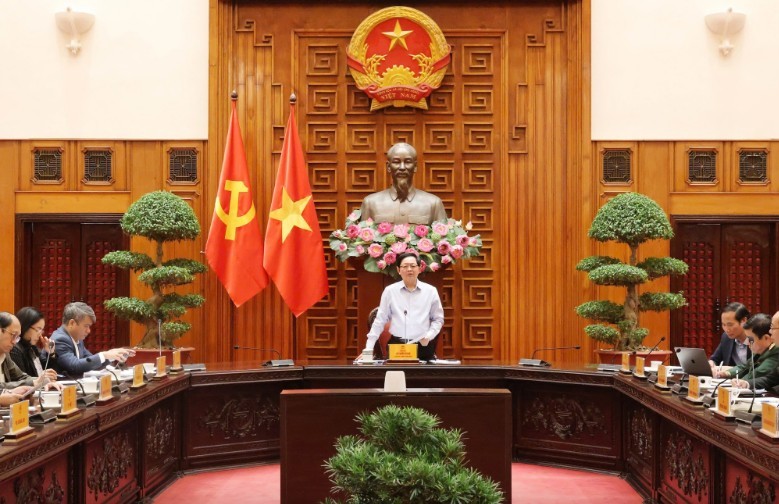 Phó Thủ tướng Hồ Quốc Dũng chủ trì cuộc họp đánh giá tình hình triển khai Nghị quyết 66-NQ/TW và Nghị quyết 140/NQ-CP - Ảnh: VGP.