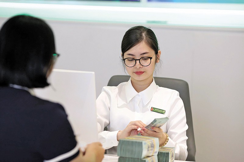Lãi suất huy động của các ngân hàng đang tăng, nên nhiều khả năng lãi suất cho vay sẽ sớm điều chỉnh tăng. Ảnh: Đức Thanh 