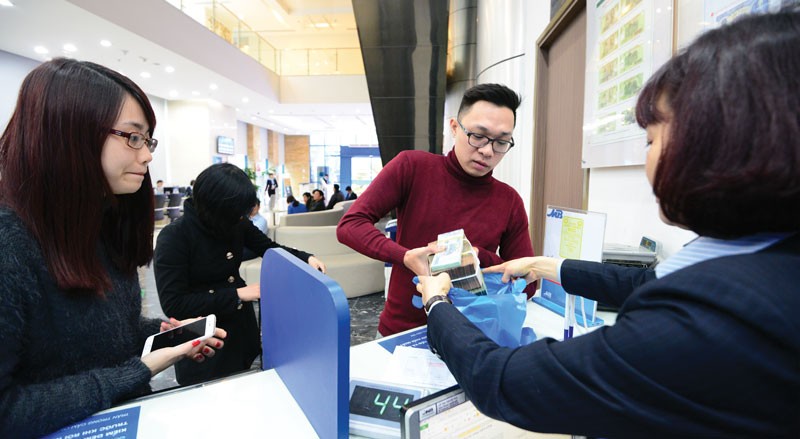 Tăng trưởng tín dụng toàn hệ thống cả năm 2015 ước đạt khoảng 18% 
