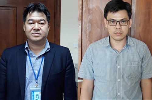 Ông Giang và Quang vừa bị bắt giữ.