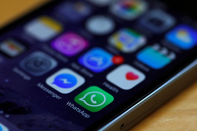 Facebook sẽ phải thiết kế lại cách làm việc cho Messenger và WhatsApp trên iOS
Ảnh: Reuters.