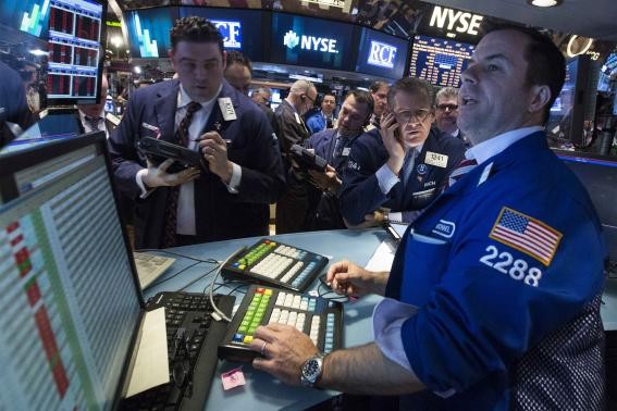 Phố Wall hồi phục tốt trong phiên đầu tuần mới - Ảnh: Reuters