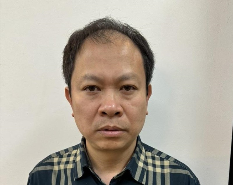Bị can Lã Tuấn Hưng, Tổng giám đốc Tổng công ty cổ phần Sông Hồng (mã chứng khoán SHG). Ảnh: BCA