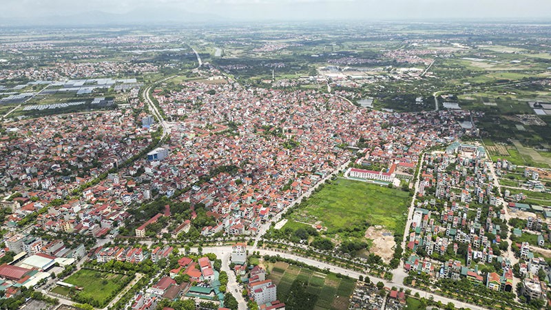 Tại Kỳ họp thứ chín của Quốc hội, Bộ trưởng Bộ Tài chính thừa ủy quyền của Thủ tướng Chính phủ trình Quốc hội sửa đổi, bổ sung một số điều của Luật Quy hoạch. Trong ảnh: Hạ tầng khu vực huyện Đan Phượng (Hà Nội) 