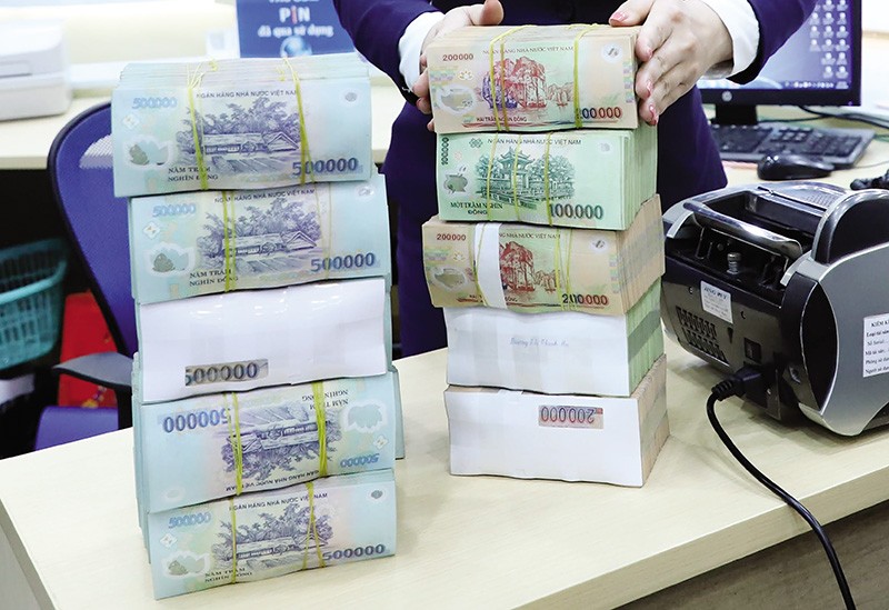 Nợ xấu đang có xu hướng tăng lên, ảnh hưởng đến hoạt động ngân hàng và mặt bằng lãi suất. Ảnh: Đức Thanh 