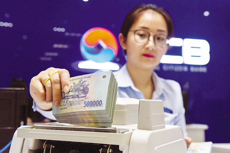 Cần vốn để mở rộng tăng trưởng, nhiều ngân hàng tăng vốn qua chia cổ tức bằng cổ phiếu. Ảnh: Đức Thanh 