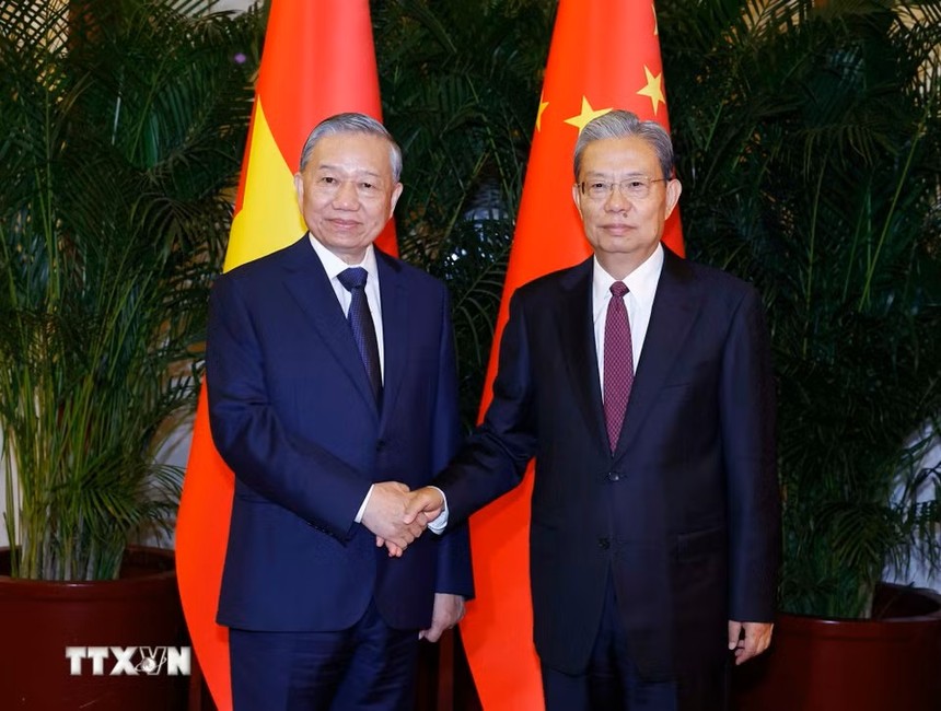 Tổng Bí thư, Chủ tịch nước Tô Lâm hội kiến Ủy viên trưởng Nhân đại toàn quốc Trung Quốc Triệu Lạc Tế. (Ảnh: Thống Nhất/TTXVN)