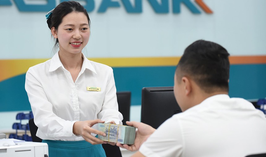 Tín dụng tăng khiến các ngân hàng phải đẩy mạnh huy động vốn