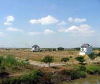 Mua đất, không sử dụng chờ bán lại có thể phải đóng thuế 50% lợi nhuận