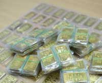 Vàng tăng nhờ USD giảm